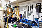 scuba tech cyprus' dive equipment servicing bench with servicing tools and kits