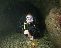 scuba diving in cyprus. Diver in a cave