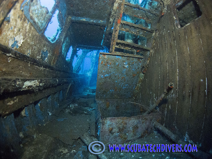 deck walkways along the side of alexandri wreck with stairs up to upper deck