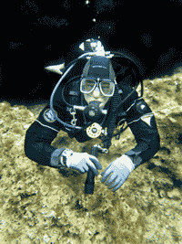 Diver with GUE standard configuration of equipment