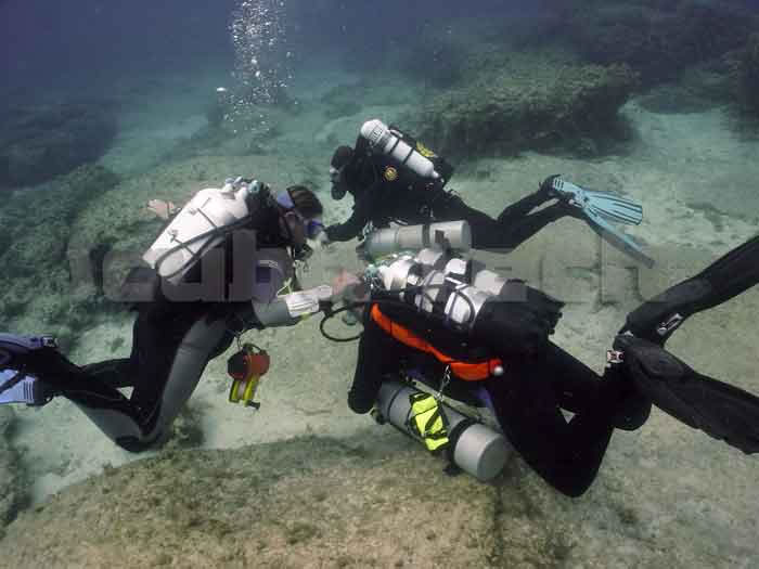 rebreather and twin set diver at cyclops