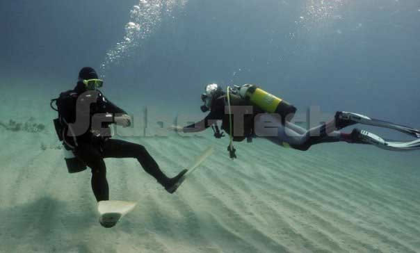 diving instrucor with diver on dive training course in cyprus